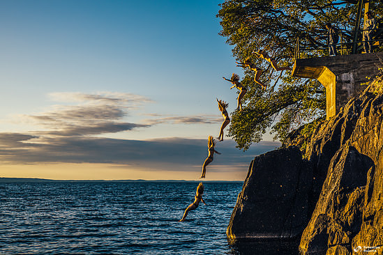 Jumper in the cold waters of the lake Vättern, Sweden